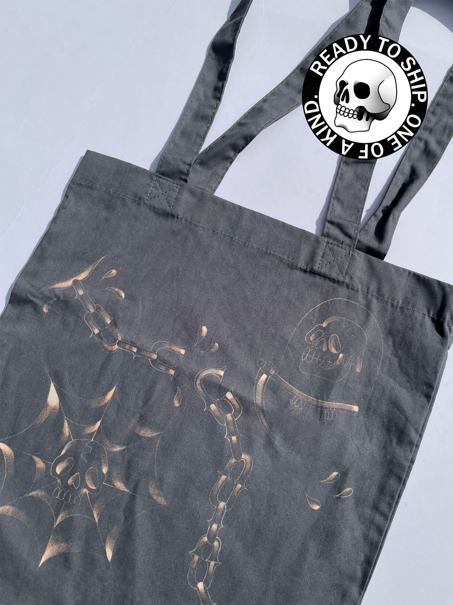 Grey spooky hand painted tote bag